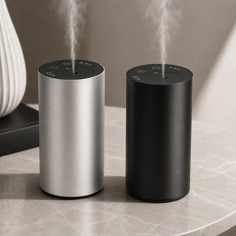 Sleek silver and black rechargeable electric aroma diffuser with a 20ml oil capacity and convenient USB charging.